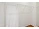 Empty closet with white walls, wire shelves, and wood-look flooring at 13 Pegram Ct, Durham, NC 27703