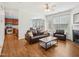 Inviting living room with hardwood floors, a fireplace, and an open layout at 13 Pegram Ct, Durham, NC 27703