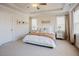 A cozy bedroom featuring a comfortable queen size bed and two bedside tables at 134 Cotten Dr, Morrisville, NC 27560