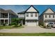 Charming two-story home featuring a two-car garage and beautifully landscaped front yard at 134 Cotten Dr, Morrisville, NC 27560