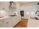 Well-equipped kitchen featuring ample counter space, stainless steel appliances, and modern finishes at 134 Cotten Dr, Morrisville, NC 27560