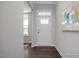 Bright foyer featuring hardwood floors, recessed lighting, and neutral paint at 1412 Main St, Lillington, NC 27546
