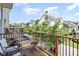 Relaxing balcony with seating overlooks the neighborhood, offering a peaceful outdoor retreat at 1427 Van Page Blvd, Raleigh, NC 27607