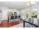 Bright kitchen with an island, stainless steel appliances, and modern finishes at 1427 Van Page Blvd, Raleigh, NC 27607