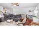 Comfortable living room showcasing a sectional sofa and natural light at 1427 Van Page Blvd, Raleigh, NC 27607