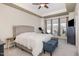 Bright bedroom has large windows, a tray ceiling, and neutral décor at 1427 Van Page Blvd, Raleigh, NC 27607