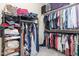 Walk-in closet with ample storage space, shelving, and rods for organization at 1427 Van Page Blvd, Raleigh, NC 27607