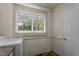 This laundry room is adjacent to washer and dryer at 1512 Oxford Rd, Henderson, NC 27536