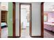 The house's hallway features doorways to bedrooms and a bathroom at 1608 New Hill Olive Chapel Rd, Apex, NC 27502