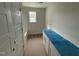 Bathroom featuring a vanity with a countertop and natural light from a window at 162 Tuskeegee Dr, Smithfield, NC 27577