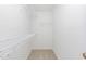Walk-in closet with carpeted floors and wire shelving to maximize storage and organization at 162 Tuskeegee Dr, Smithfield, NC 27577