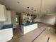 Kitchen with island and stainless steel appliances at 162 Tuskeegee Dr, Smithfield, NC 27577