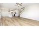 Open-concept space with living room, staircase, and kitchen with island at 162 Tuskeegee Dr, Smithfield, NC 27577
