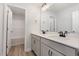Modern bathroom featuring a double vanity with sleek fixtures and a shower-tub combination at 188 Tuskeegee Dr, Smithfield, NC 27577