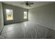 Bright bedroom with large windows, neutral walls, and ample natural light at 188 Tuskeegee Dr, Smithfield, NC 27577
