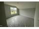 Bright, spacious bedroom with a large window offering outdoor views at 188 Tuskeegee Dr, Smithfield, NC 27577