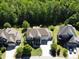 Suburban residence showcases a spacious lot, traditional architecture, and a three-car garage at 1927 Napoli Dr, Apex, NC 27502