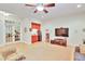 Entertainment area with wet bar, television, and comfortable seating at 1927 Napoli Dr, Apex, NC 27502