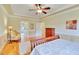 Comfortable main bedroom boasts hardwood floors, a sitting area, and an ensuite bathroom for ultimate relaxation at 1927 Napoli Dr, Apex, NC 27502