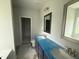 Bathroom with double vanity, framed mirrors, and a walk-in closet at 202 Tuskeegee Dr, Smithfield, NC 27577