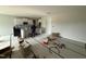 Eat-in kitchen with white cabinets and large island; still under construction at 202 Tuskeegee Dr, Smithfield, NC 27577