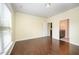 Spacious bedroom with hardwood floors, neutral paint, and an attached bathroom at 219 Rosedale Creek Dr, Durham, NC 27703