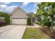 Charming home featuring a two-car garage, and beautifully landscaped front yard at 219 Rosedale Creek Dr, Durham, NC 27703