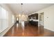 Open-concept kitchen with a large island and stainless steel appliances at 219 Rosedale Creek Dr, Durham, NC 27703