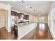 Spacious kitchen with a large granite island and stainless steel appliances at 219 Rosedale Creek Dr, Durham, NC 27703