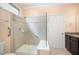 Modern bathroom with glass shower, built-in seat and safety bar at 219 Rosedale Creek Dr, Durham, NC 27703