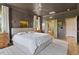Luxurious main bedroom with ensuite bathroom access, featuring neutral tones and a serene, inviting ambiance at 2212 Plowridge Rd, Fuquay Varina, NC 27526