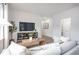 Comfortable and modern living room featuring stylish decor and a sleek entertainment center at 232 Moyer Dr, Graham, NC 27253
