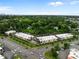 An aerial shot of newly constructed commercial property featuring modern architecture, plentiful parking, and lush landscaping at 2331 Bernard St, Raleigh, NC 27608