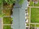 Aerial view of property showcasing well-maintained roof, lawn, and surrounding landscaping at 2331 Bernard St, Raleigh, NC 27608