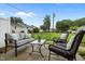 Relaxing backyard patio features comfortable seating, perfect for outdoor entertaining at 2331 Bernard St, Raleigh, NC 27608