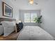 Cozy bedroom featuring bright natural light, a ceiling fan, and stylish decor at 2331 Bernard St, Raleigh, NC 27608