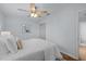 Comfortable bedroom with ceiling fan, neutral walls, and a large window offering ample natural light at 2331 Bernard St, Raleigh, NC 27608