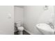 Bathroom with toilet and modern sink with modern chrome faucet in new construction home at 236 Moyer Dr, Graham, NC 27253