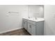 Modern bathroom with double sink vanity, chrome fixtures, and large mirror at 236 Moyer Dr, Graham, NC 27253