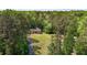 Aerial view of the home and property showing extensive tree coverage at 237 Jason Way, Youngsville, NC 27596