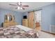 Comfortable bedroom featuring a barn door leading to the bathroom at 237 Jason Way, Youngsville, NC 27596