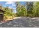 Long asphalt driveway, as well as, additional parking near the garage at 237 Jason Way, Youngsville, NC 27596