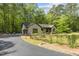 Well maintained home with a long driveway, trimmed bushes and a grassy front yard at 237 Jason Way, Youngsville, NC 27596