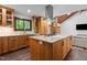 Spacious kitchen with a large island, stainless steel appliances, and granite countertops at 237 Jason Way, Youngsville, NC 27596