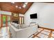 Open living room features wood ceiling, fireplace, and comfortable seating at 237 Jason Way, Youngsville, NC 27596
