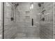 Modern walk-in shower with rainfall and handheld shower heads at 237 Jason Way, Youngsville, NC 27596