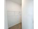 Walk-in closet with carpeted floor and wire shelving at 2403 Whitewing Ln, Wendell, NC 27591