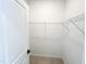 Bright walk-in closet with wire shelving at 2403 Whitewing Ln, Wendell, NC 27591