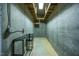 Unfinished basement featuring concrete walls, utility hookups, and open ceiling at 244 Mantle Dr, Clayton, NC 27527