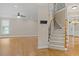 View of the foyer featuring the staircase and hardwood flooring at 244 Mantle Dr, Clayton, NC 27527